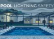 An empty backyard pool under storm clouds with lightning and a closed house nearby.