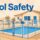 A Florida pool enclosed by a clear safety fence with a secure gate and sunny home behind it.
