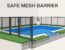 Pool fence on artificial turf with an anchored post and self-closing gate.