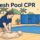 A caregiver practices chest compressions on a mannequin beside a backyard pool.